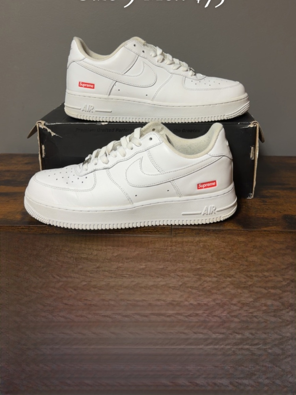 Nike Air Force 1 Supreme White Low-Top Sneakers with Red Logo Accent